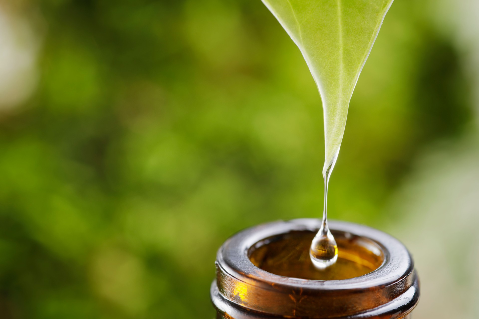 Brown herbal extraction bottle with a drop